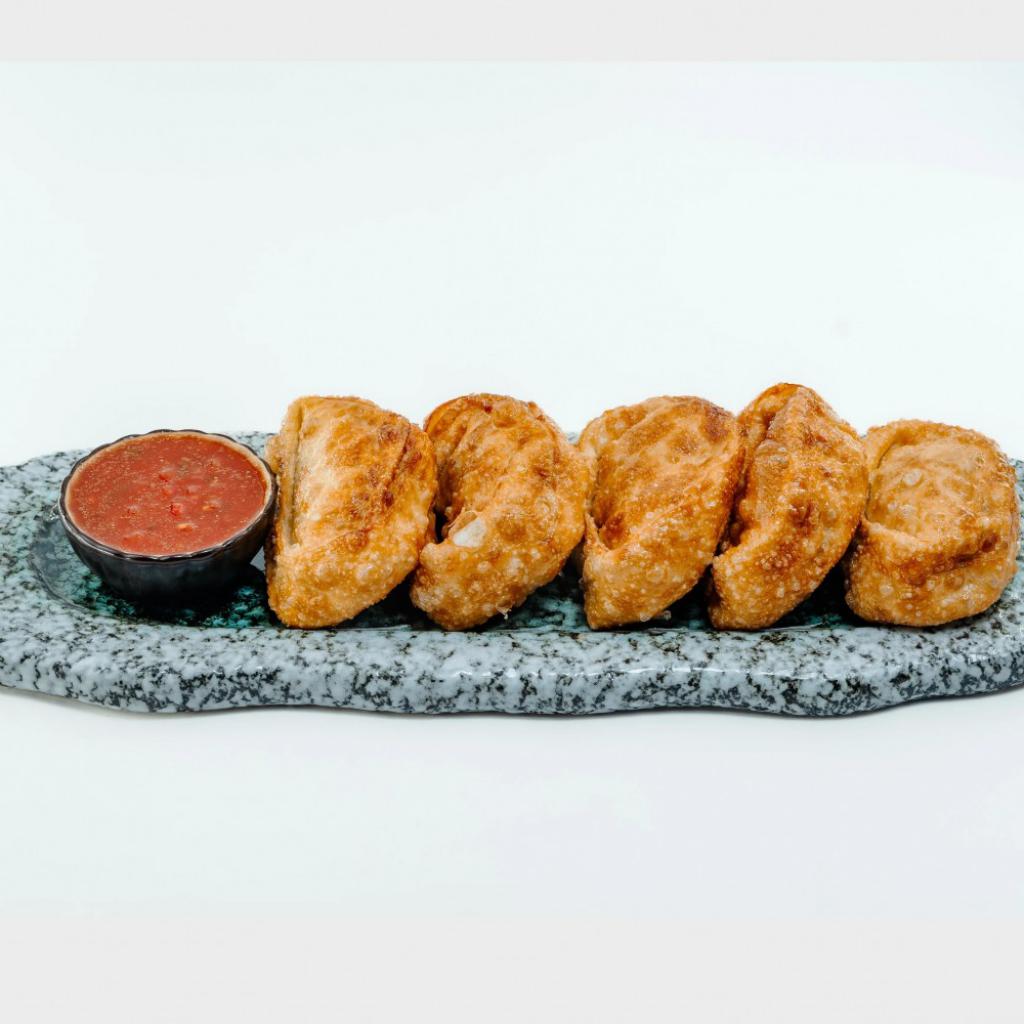 Пельмени жареные